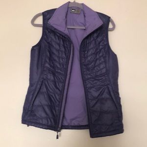 Beautiful woman’s REI vest size M